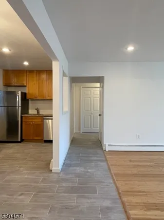 a view of a kitchen with a sink