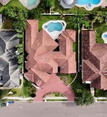 7408 North 5th Street McAllen, TX 78504 - Photo 4 of 4 an aerial view of a house with yard swimming pool and outdoor seating