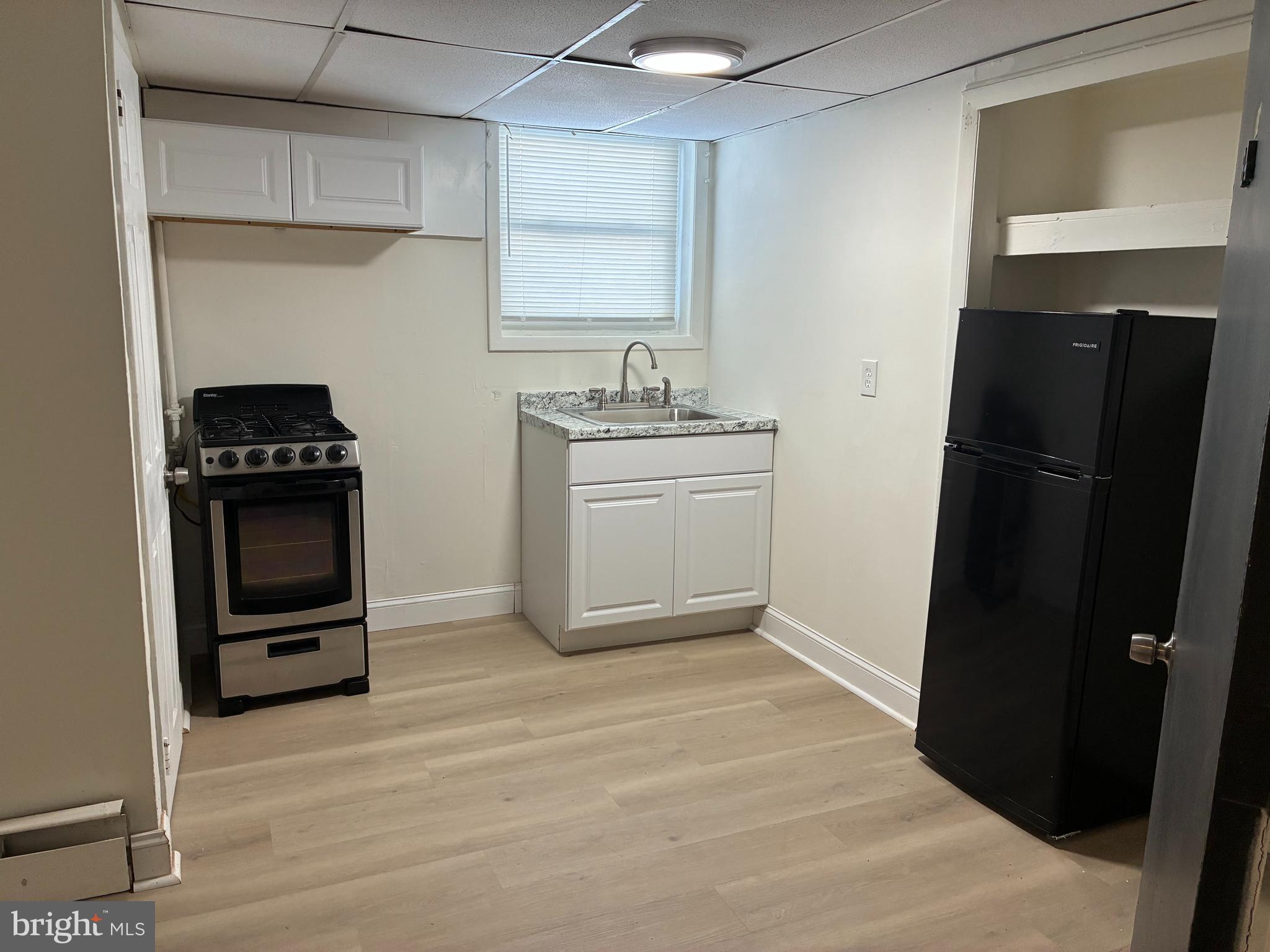 1800 Garrett Road, Unit B4 Lansdowne, PA 19050 - Photo 3 of 6 a kitchen with a sink stove and refrigerator