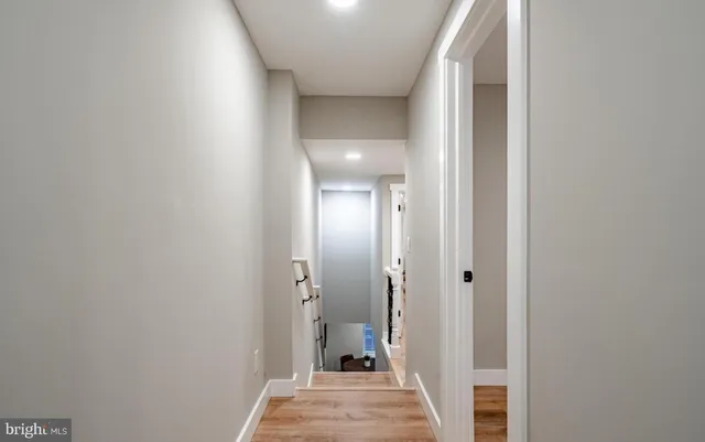 a view of a livingroom from a hallway
