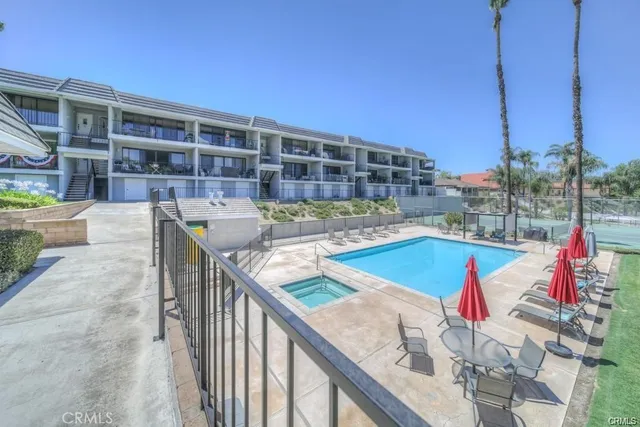 a view of a balcony and city view