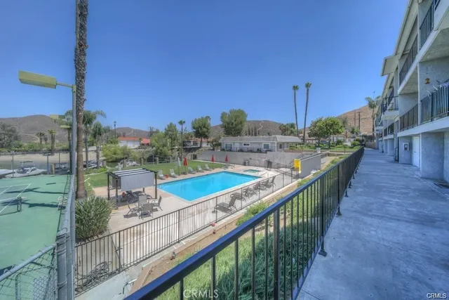 a view of a balcony and city view