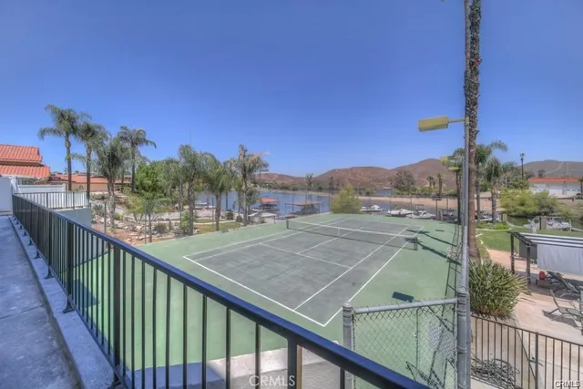 a view of balcony with furniture