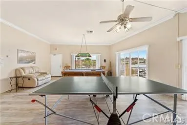 a bedroom with a bed and a television