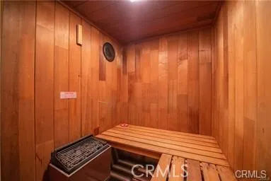 an aerial view of lake and residential houses with outdoor space