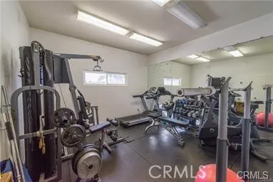 a front view of a residential apartment building with a yard