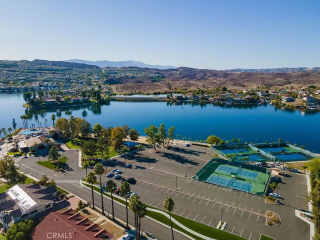 an aerial view of a house with outdoor space