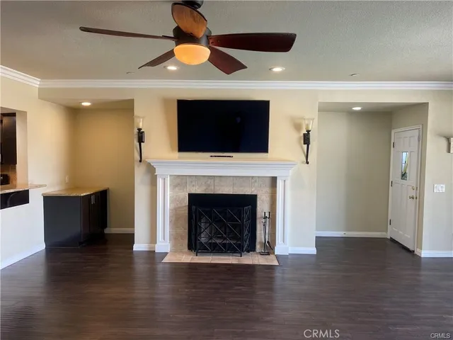 a view of bathroom with a toilet sink and mirror