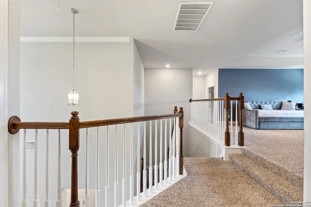 a view of hallway with furniture