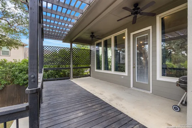 a house with wooden floor in front of a house