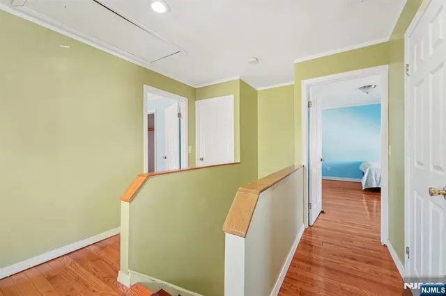 a view of a bathroom from a hallway