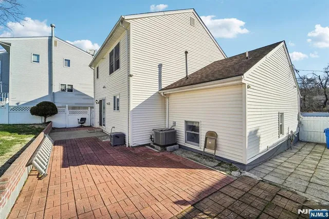 a view of a back yard of the house