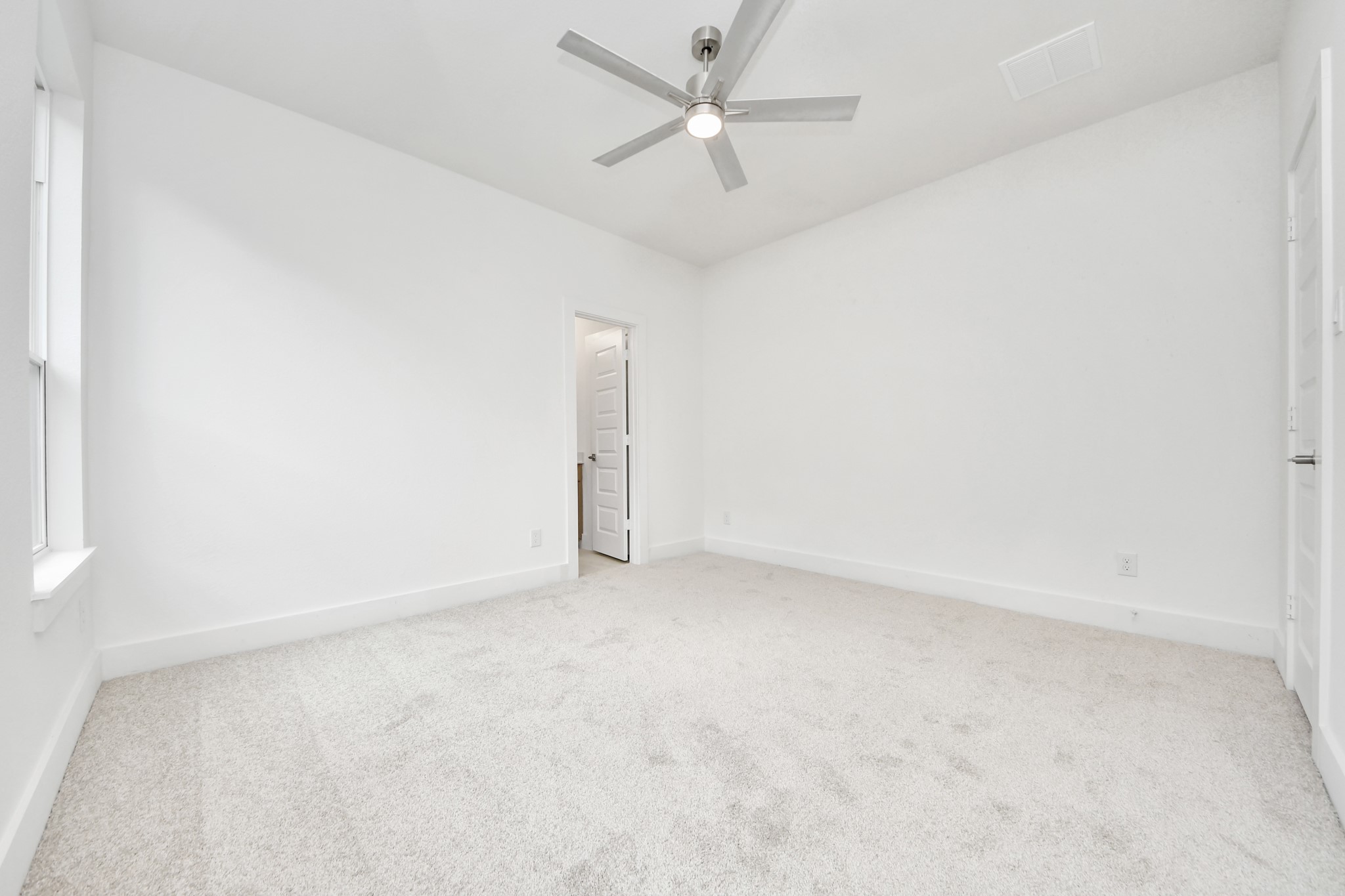 3038 Native Spg Drive Spring, TX 77373 - Photo 32 of 44 Generously sized secondary bedrooms featuring spacious closets, soft and inviting carpeting underfoot, large windows allowing plenty of natural light, and the added touch of privacy blinds for your personal retreat.