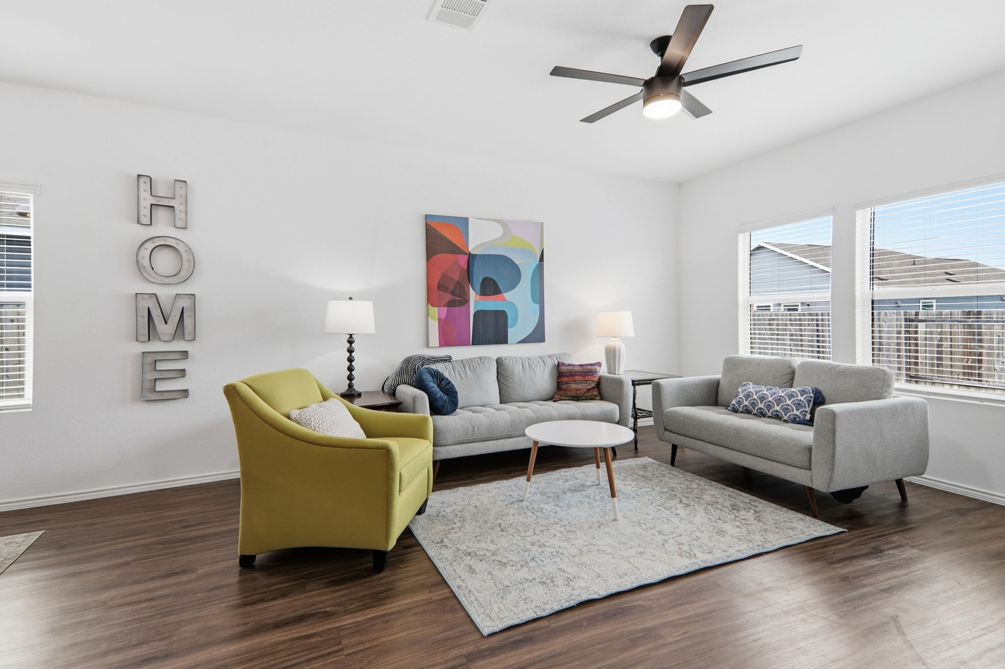 1200 Rio Frio Lane Georgetown, TX 78626 - Photo 5 of 25 Living room with dark wood-style floors and ceiling fan