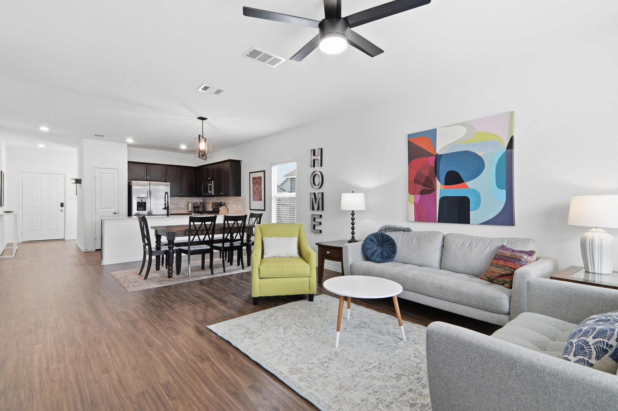 1200 Rio Frio Lane Georgetown, TX 78626 - Photo 7 of 25 Living area featuring dark wood-type flooring, recessed lighting, and ceiling fan