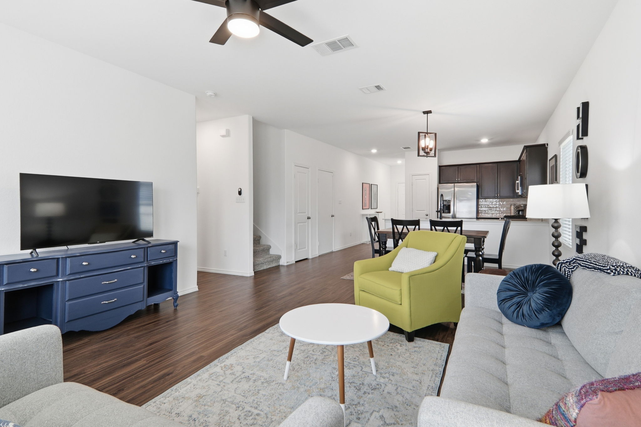 1200 Rio Frio Lane Georgetown, TX 78626 - Photo 8 of 25 Living area with dark wood-style flooring, stairs, recessed lighting, and a ceiling fan