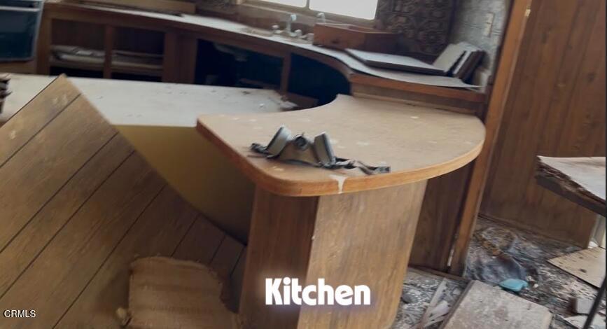 91525 Palm Road Baker, CA 92309 - Photo 20 of 39 a terrace with outdoor seating and wooden floor