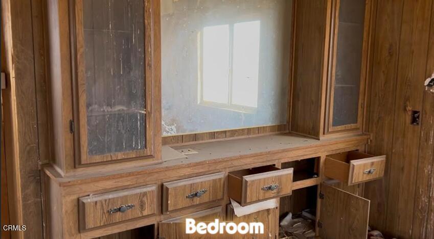 91525 Palm Road Baker, CA 92309 - Photo 21 of 39 a kitchen with stainless steel appliances granite countertop a stove and a microwave oven