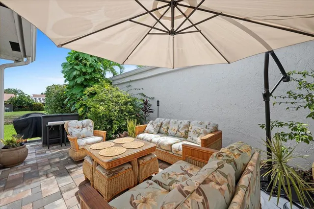 a view of a swimming pool with a patio