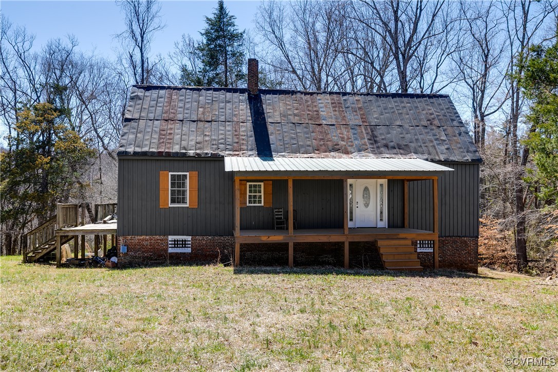 14 Ca Ira Road Cumberland, VA 23040 - Photo 19 of 43 a front view of a house with garden