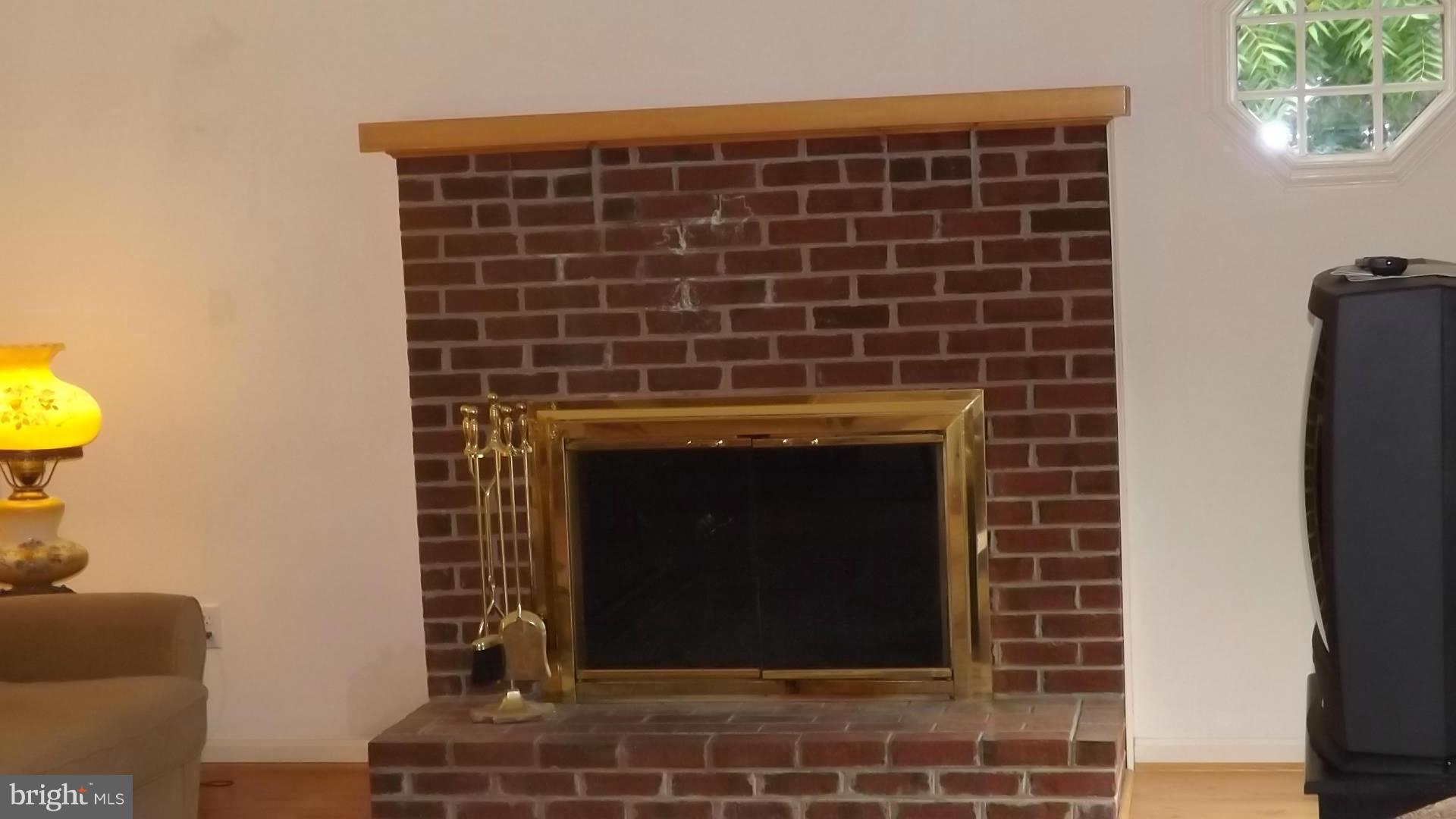 103 Douglas Ln Street St. Michaels, MD 21663 - Photo 11 of 28 a close view of a fireplace in a room