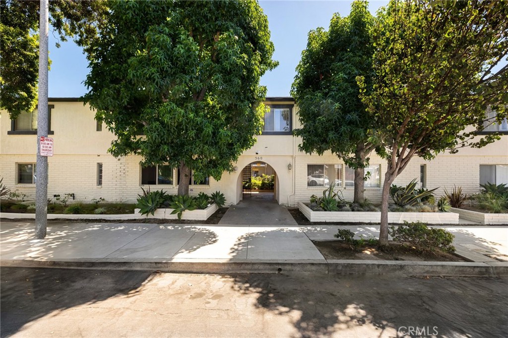 360 Gladys Avenue, Unit 2 Long Beach, CA 90814 - Photo 1 of 22 a front view of a house with a yard