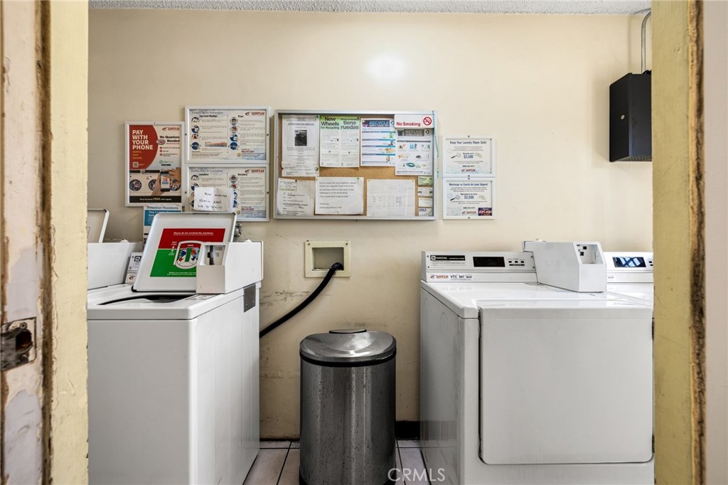 360 Gladys Avenue, Unit 2 Long Beach, CA 90814 - Photo 17 of 22 a utility room with dryer and washer