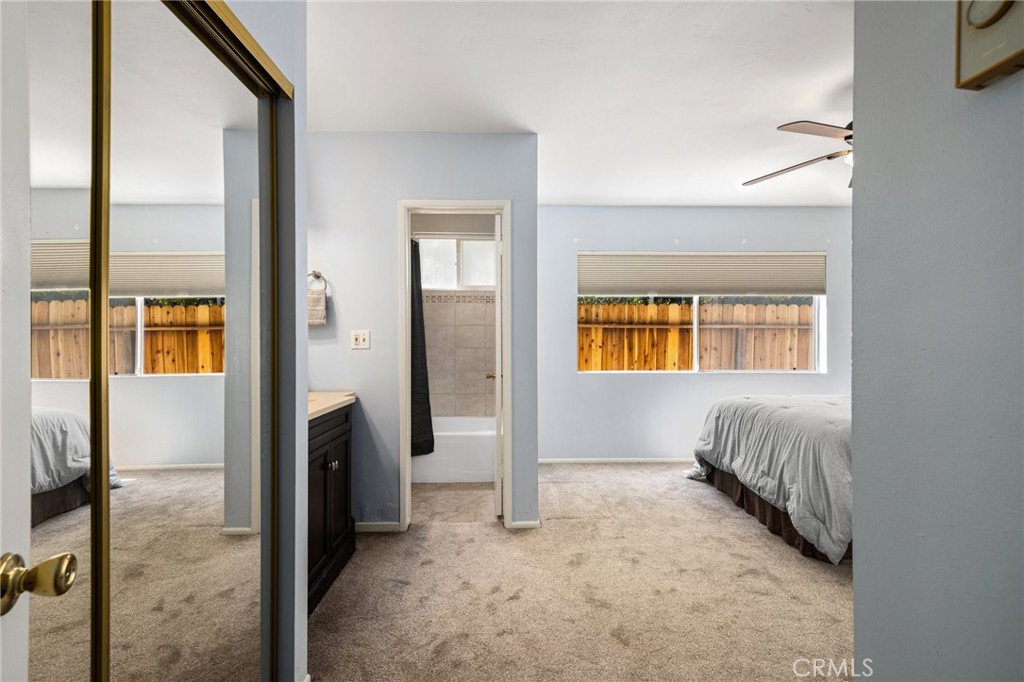 360 Gladys Avenue, Unit 2 Long Beach, CA 90814 - Photo 9 of 22 a view of a bedroom with a bed and a window