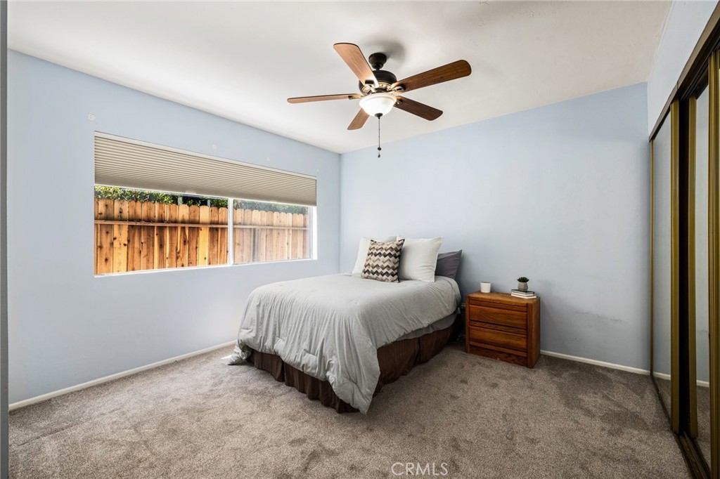 360 Gladys Avenue, Unit 2 Long Beach, CA 90814 - Photo 10 of 22 a bedroom with a bed and window