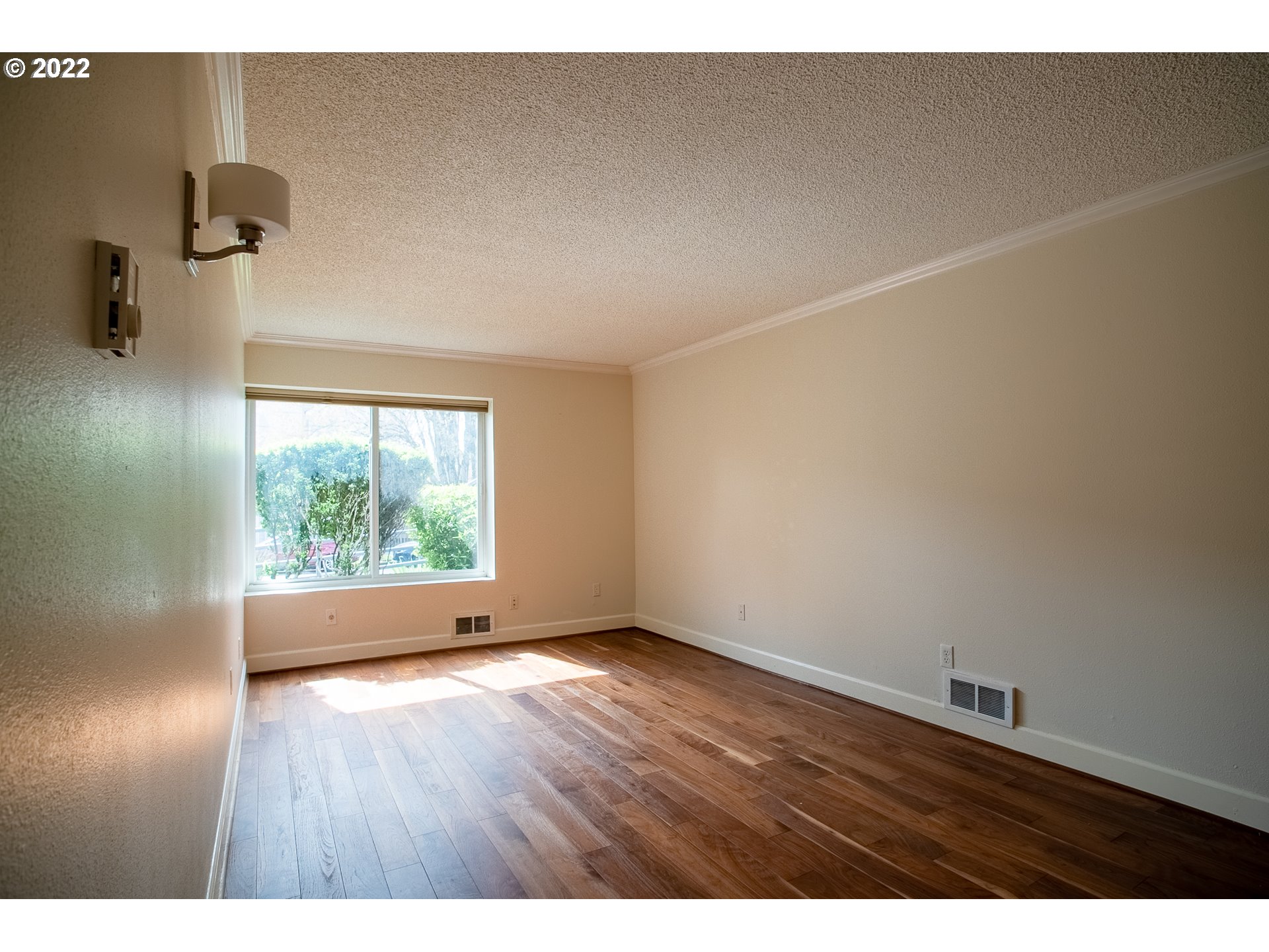 1727 Northeast Multnomah Street, Unit 2 Portland, OR 97232 - Photo 1 of 10 a view of an empty room and wooden floor