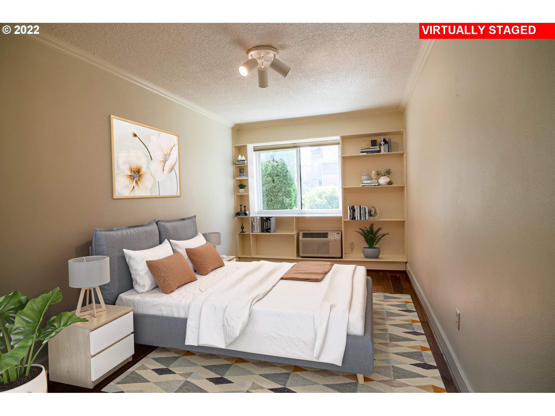 1727 Northeast Multnomah Street, Unit 2 Portland, OR 97232 - Photo 6 of 10 a bed room with a bed and a painting