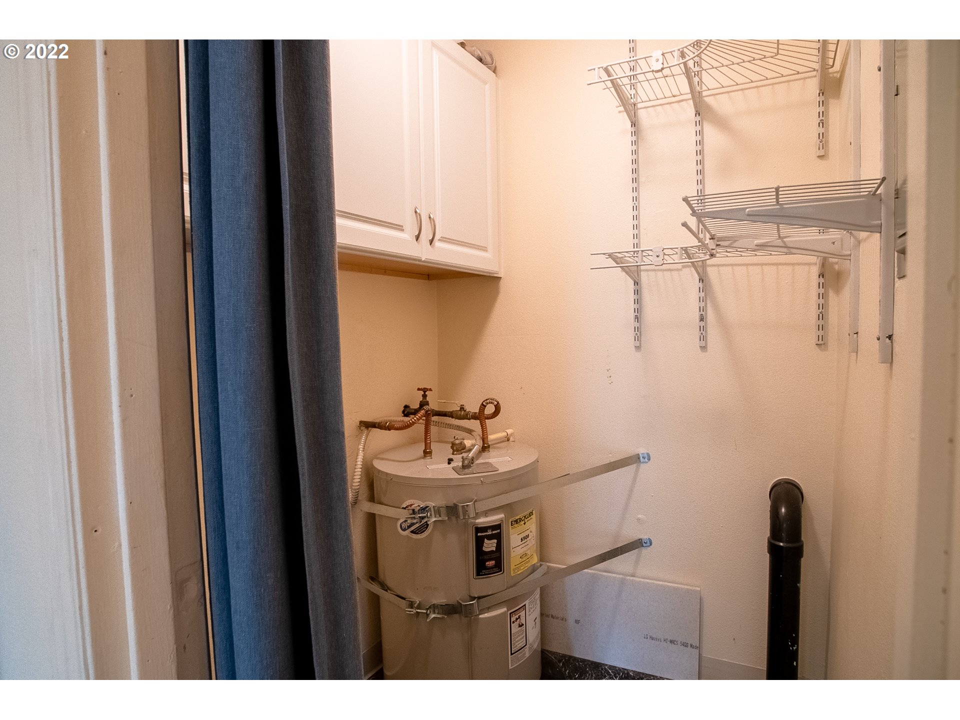 1727 Northeast Multnomah Street, Unit 2 Portland, OR 97232 - Photo 9 of 10 a bathroom with a sink vanity and a mirror