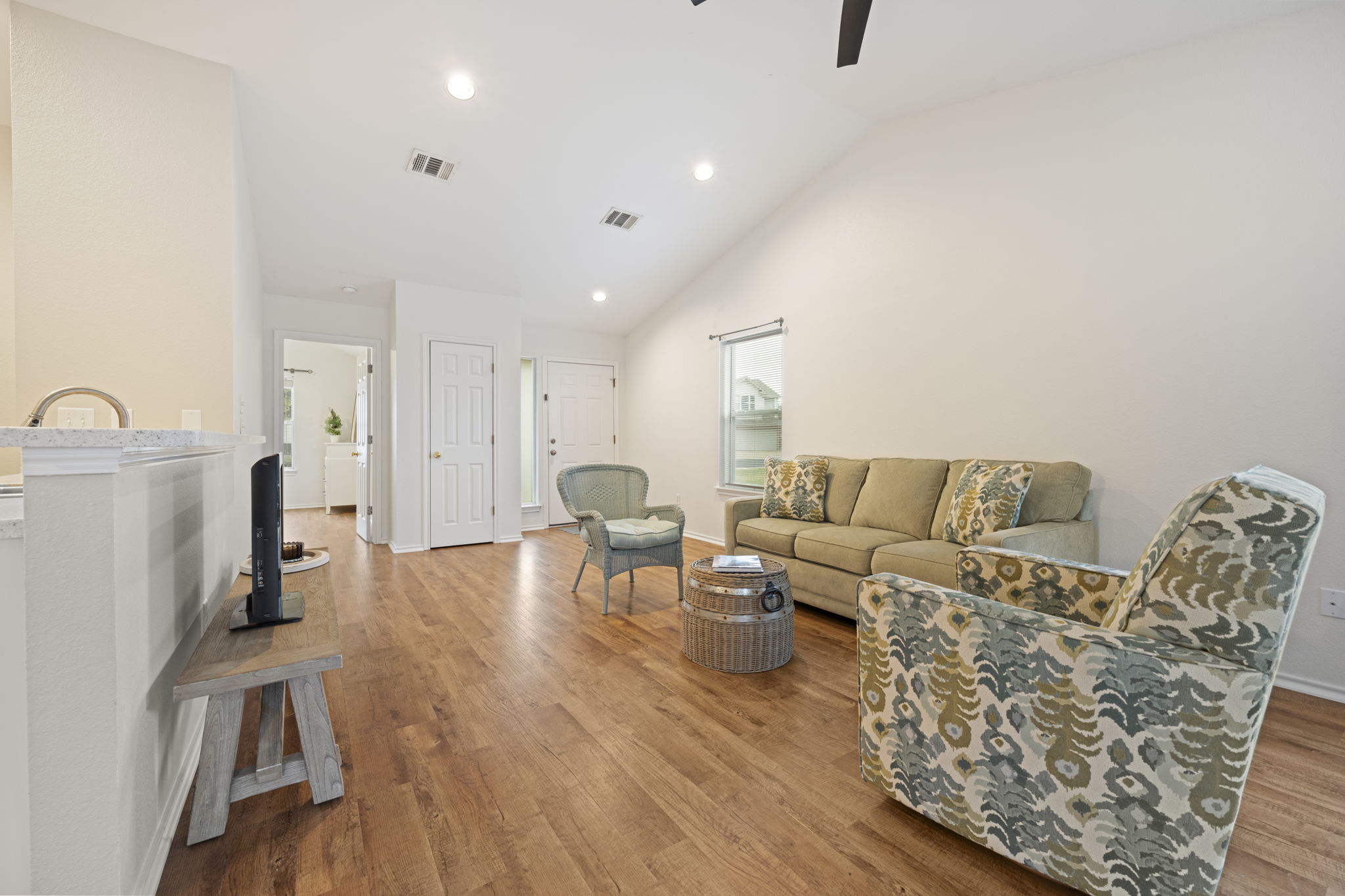 1011 Janae Court Georgetown, TX 78626 - Photo 12 of 26 a living room with furniture and a wooden floor
