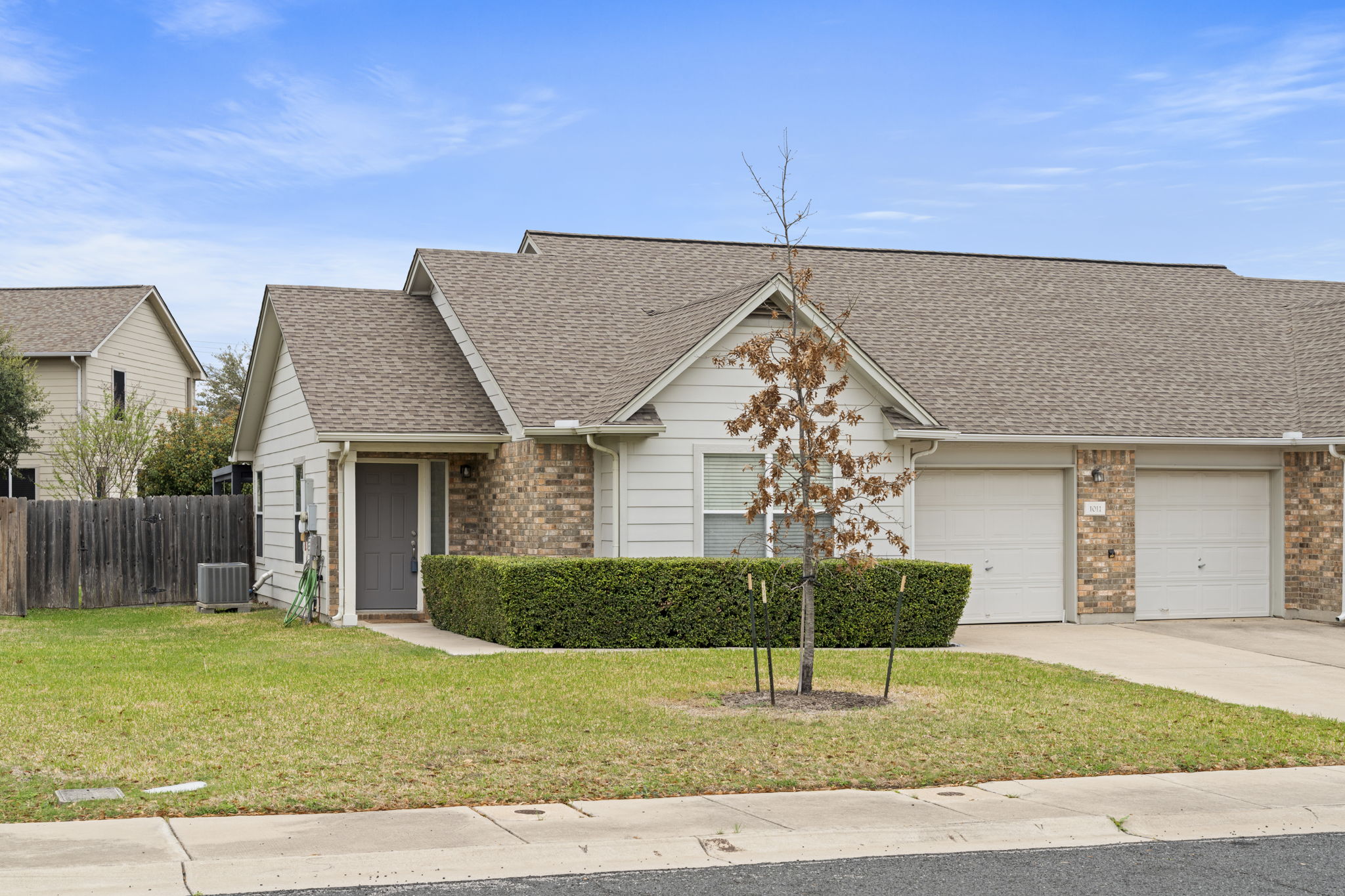 1011 Janae Court Georgetown, TX 78626 - Photo 2 of 26 a house view with a garden space