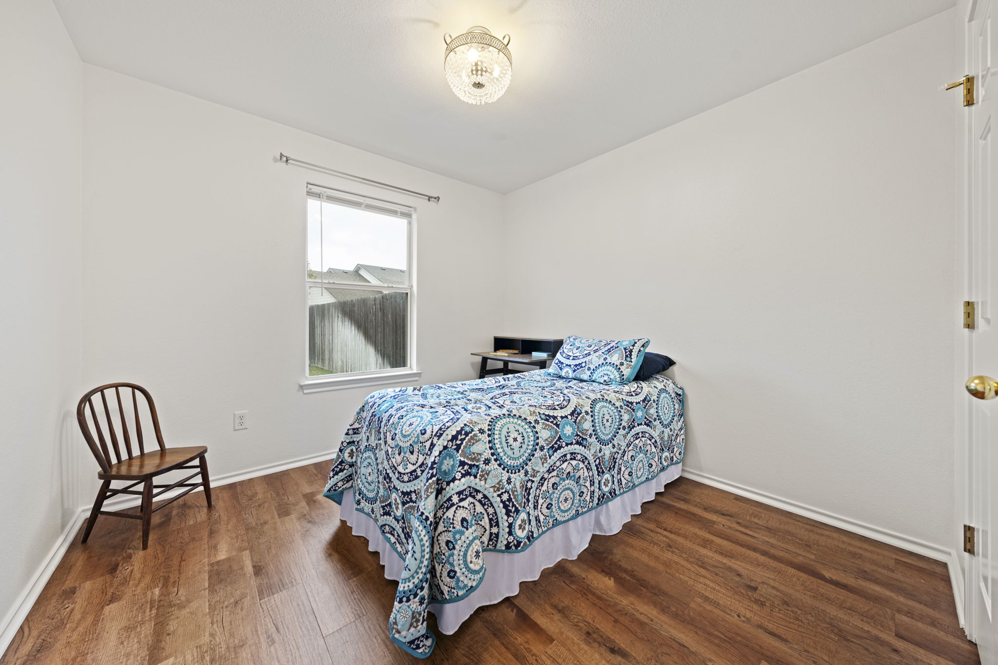 1011 Janae Court Georgetown, TX 78626 - Photo 21 of 26 a bedroom with a bed and a window
