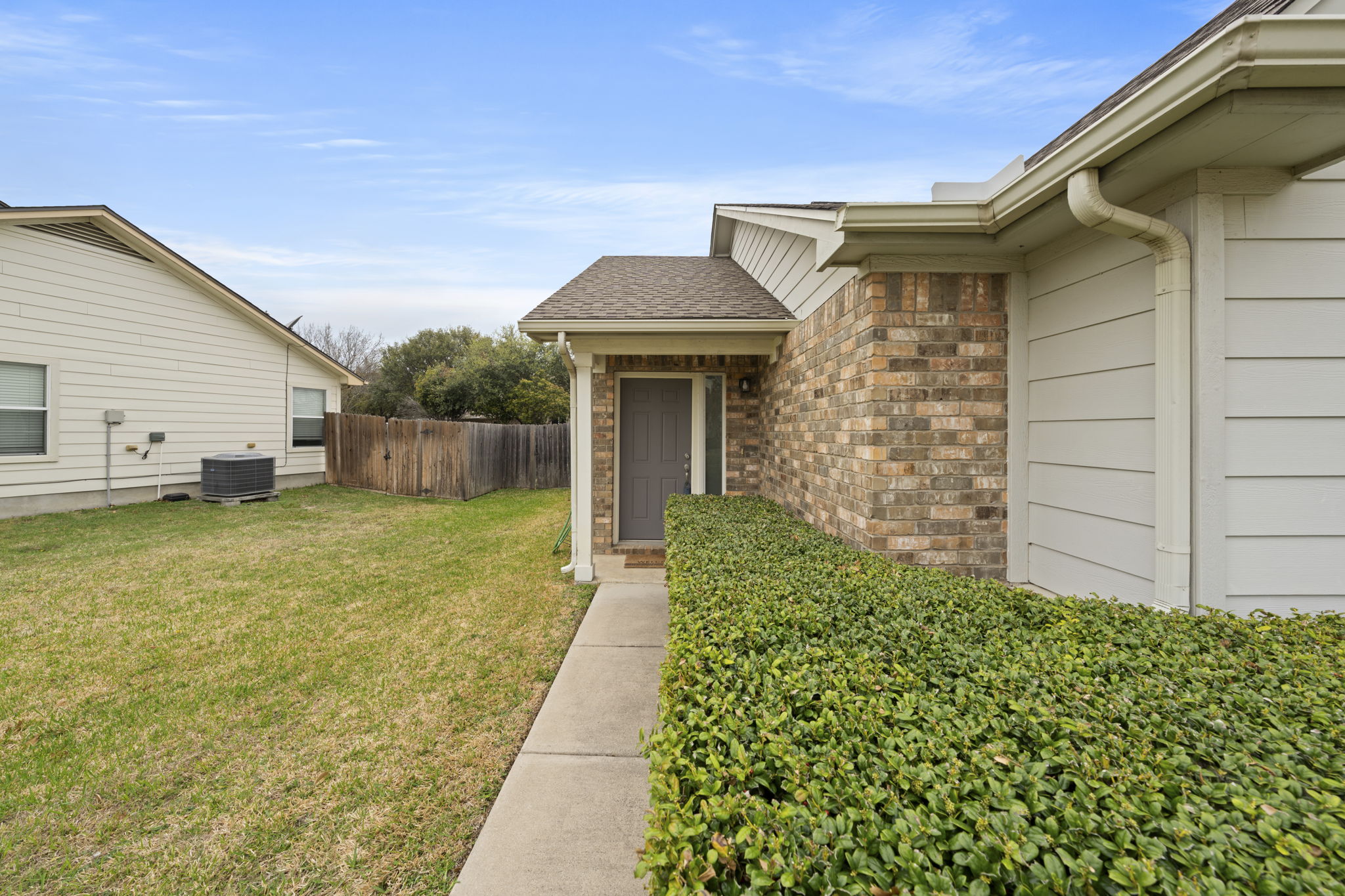 1011 Janae Court Georgetown, TX 78626 - Photo 23 of 26 a front view of a house with garden