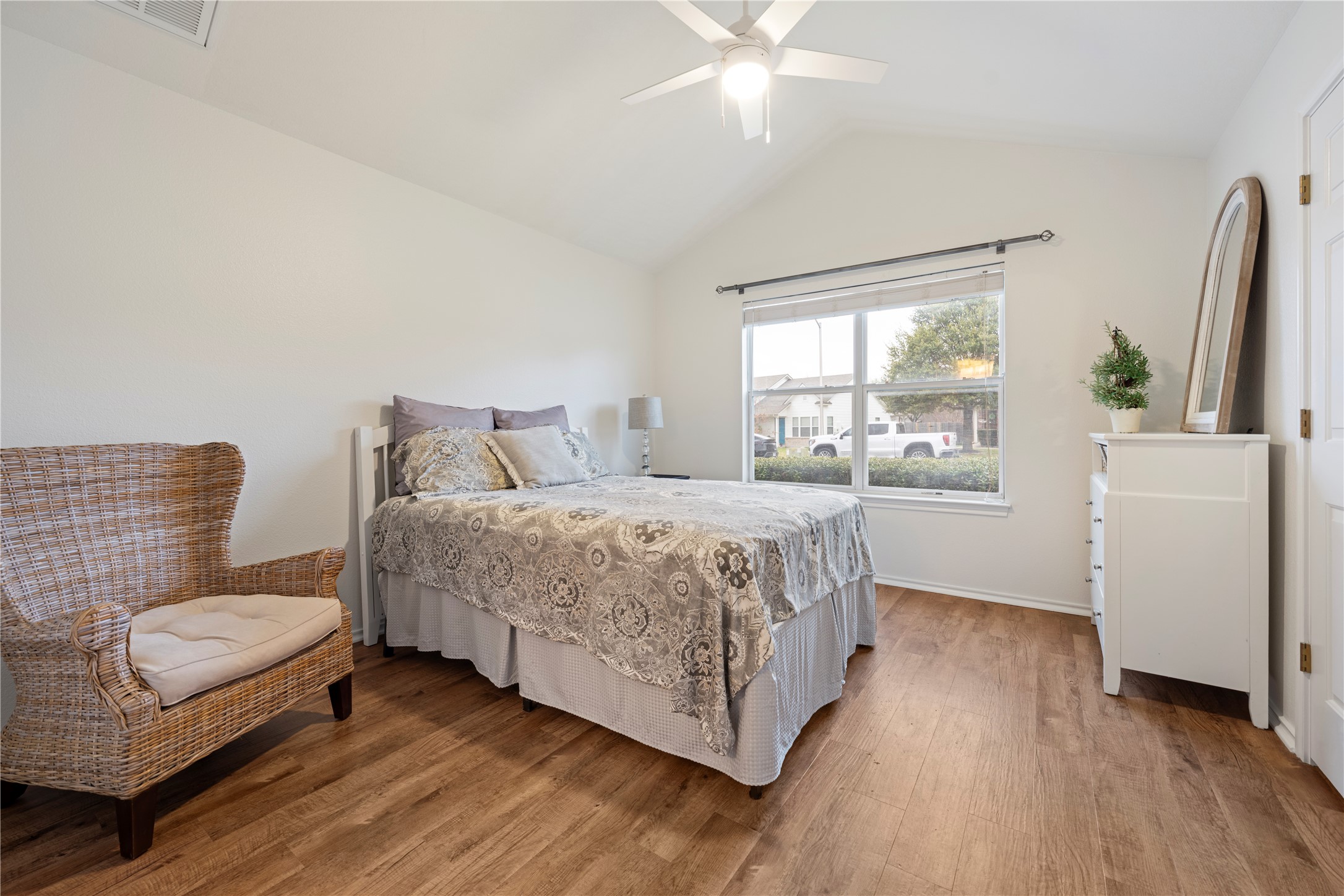 1011 Janae Court Georgetown, TX 78626 - Photo 26 of 26 a bedroom with a bed and a couch