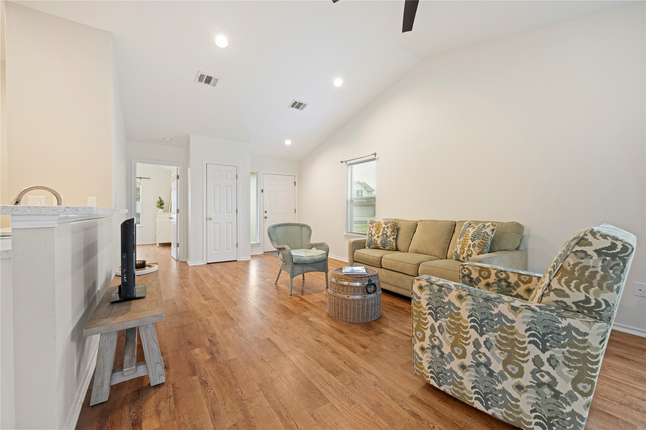 1011 Janae Court Georgetown, TX 78626 - Photo 5 of 26 a living room with furniture and a wooden floor