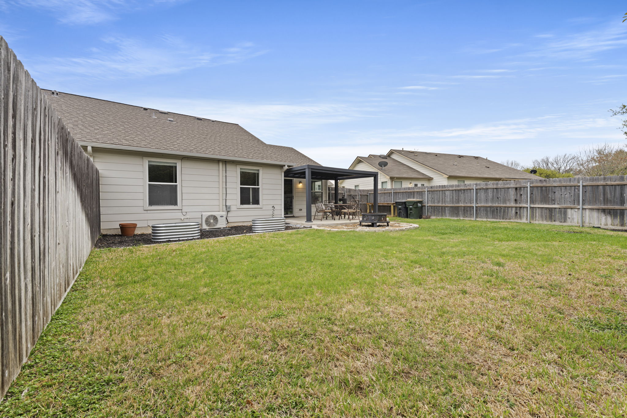 1011 Janae Court Georgetown, TX 78626 - Photo 8 of 26 a view of a house with a yard porch and sitting area