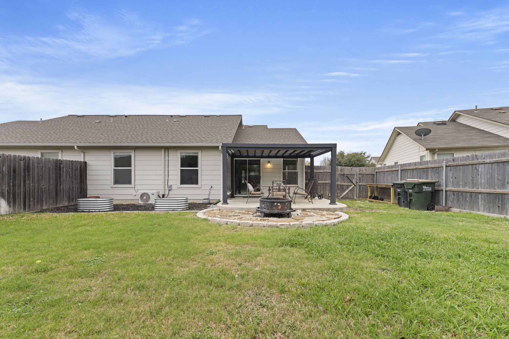 1011 Janae Court Georgetown, TX 78626 - Photo 10 of 26 a front view of house with yard and seating area