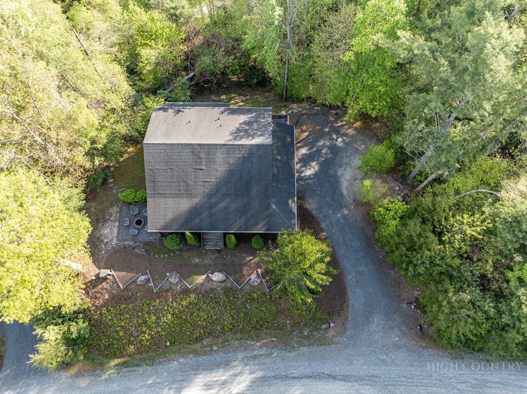 197 Woodby Ridge Road Vilas, NC 28692 - Photo 44 of 45 an aerial view of a house with yard and outdoor seating