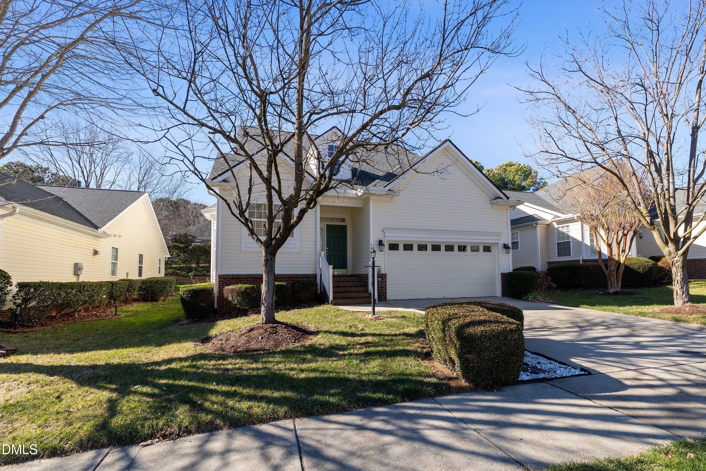 105 Rockport Ridge Way Cary, NC 27519 - Photo 40 of 43 a front view of a house with garden