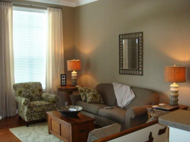 2401 Stratford Commons Decatur, GA 30033 - Photo 1 of 1 a living room with furniture and a window