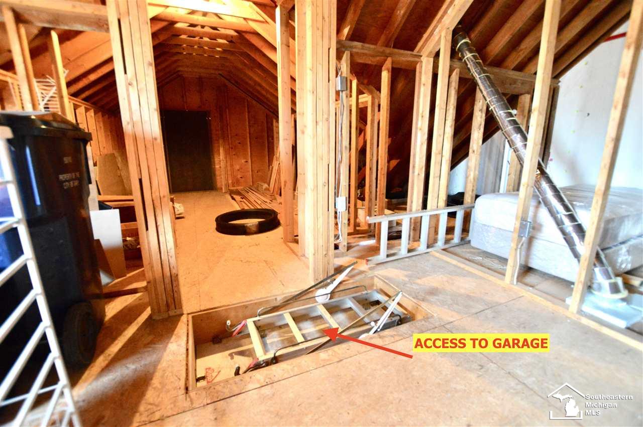 744 East Hurd Road Monroe, MI 48162 - Photo 32 of 68 BONUS ROOM WITH A PERK. STORAGE FROM GARAGE OR FROM INSIDE.