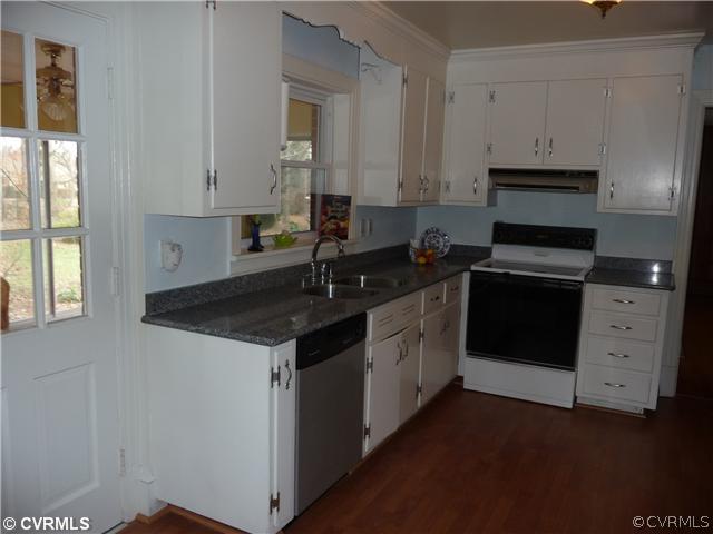 4516 Arrowhead Road Richmond, VA 23235 - Photo 4 of 12 Kitchen - Kitchen features laminate wood floors, p