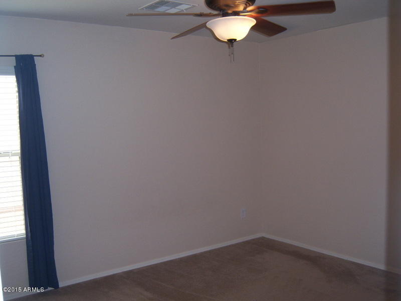 18491 North Madison Road Maricopa, AZ 85139 - Photo 26 of 32 BECKSTEAD-FRESHLY PAINTED BEDROOM