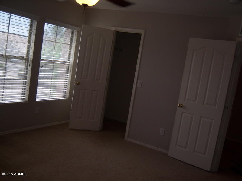 18491 North Madison Road Maricopa, AZ 85139 - Photo 29 of 32 BECKSTEAD-BEDROOM 2A WITH CLOSET