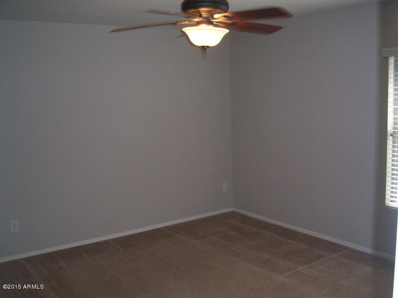 18491 North Madison Road Maricopa, AZ 85139 - Photo 32 of 32 BECKSTEAD-BEDROOM 2- FRESH PAINT