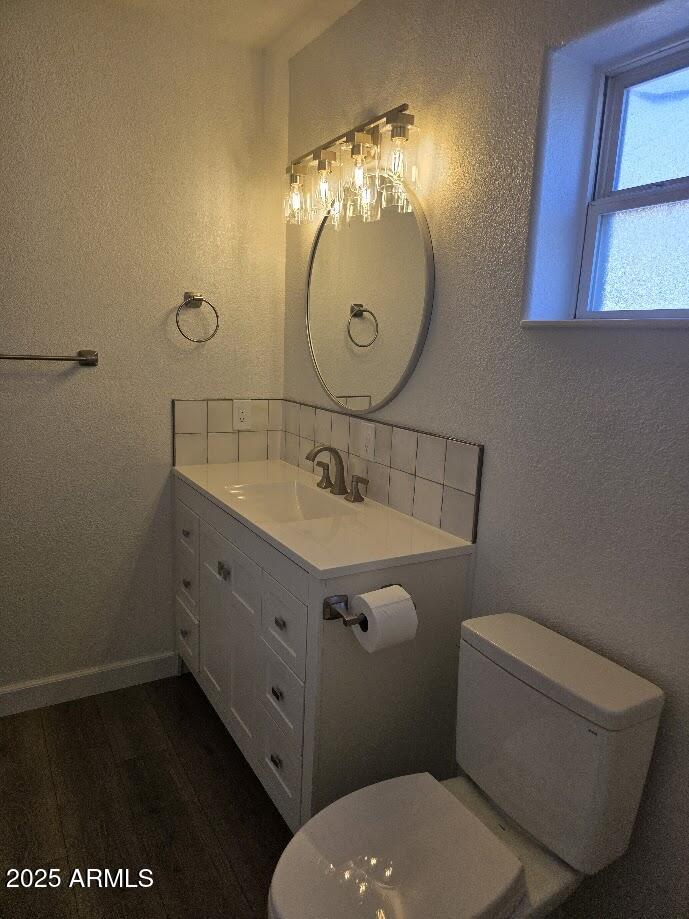 142 West 7th Street Eagar, AZ 85925 - Photo 15 of 25 a bathroom with a granite countertop toilet sink and mirror