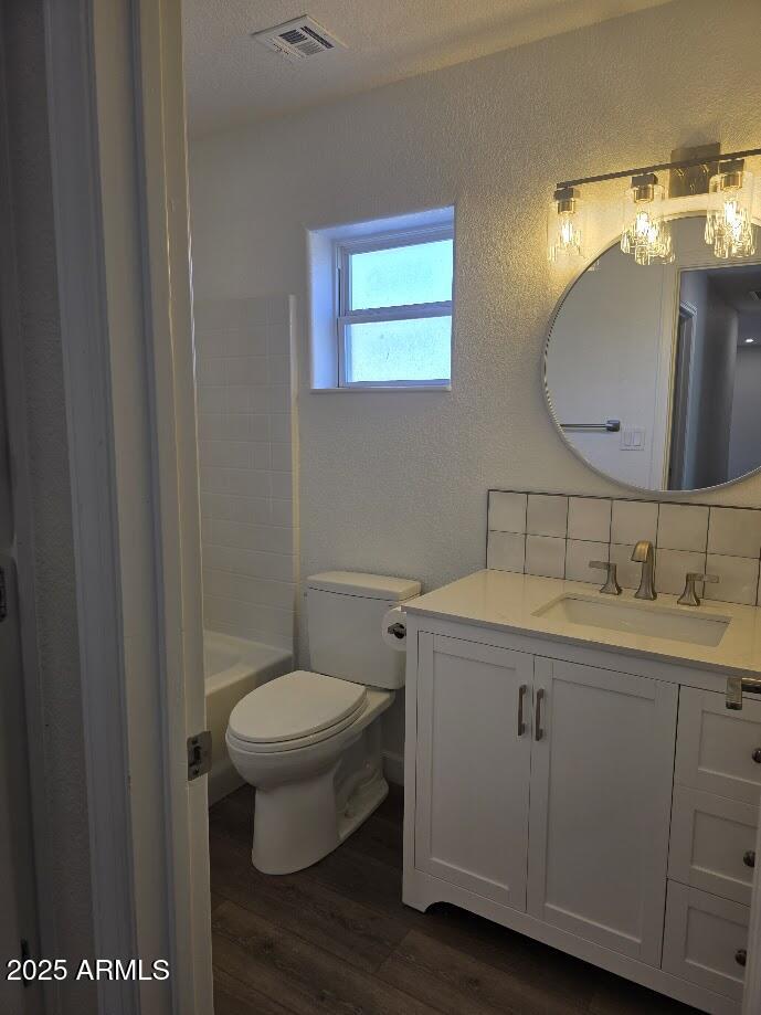 142 West 7th Street Eagar, AZ 85925 - Photo 22 of 25 a bathroom with a toilet a sink and mirror
